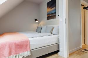 Ein Bett oder Betten in einem Zimmer der Unterkunft Seetiid