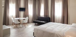 Posteľ alebo postele v izbe v ubytovaní Hotel & Wellness Stella Delle Langhe