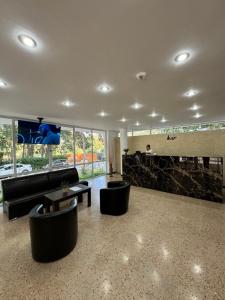 TV a/nebo společenská místnost v ubytování Hotel Callatis