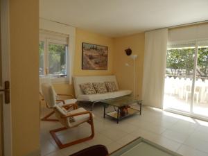 Posezení v ubytování Les Pites I 2n 2a Bonito apartamento con terraza