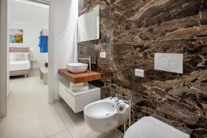 Koupelna v ubytování B&B GargiuloFamily + 10 fotografií