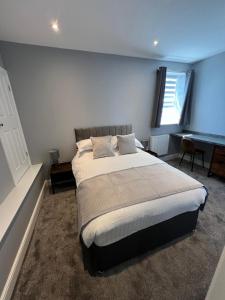 The Globe Apartments客房内的一张或多张床位