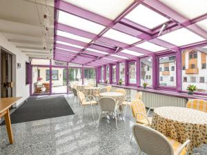Restaurace v ubytování Apartment Olympia by Interhome