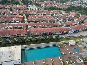 an aerial view of a city with a swimming pool at Evo Green Tea 25 with Netflix in Bandar Baru Bangi