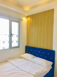 Postel nebo postele na pokoji v ubytování Rendez-vous 2BR Condo Unit at SMDC Cheer + 37 fotografií