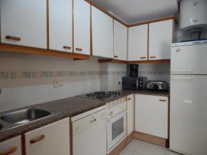 Kuchyň nebo kuchyňský kout v ubytování Les Pites I 2n 2a Bonito apartamento con terraza