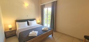 Posteľ alebo postele v izbe v ubytovaní Paleo Inn Hotel + 36 fotografií