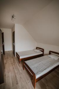 Ένα ή περισσότερα κρεβάτια σε δωμάτιο στο Villa pod gruszą +37 φωτογραφίες