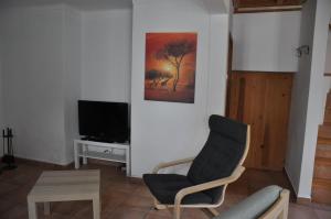 TV/trung tâm giải trí tại Casa-Agave-Quinta-da-Encavalada-relaxing-holiday-house-with-beautiful-view-and-swimmingpool