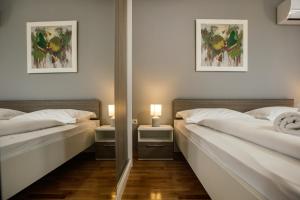 Posteľ alebo postele v izbe v ubytovaní Villa Matko - family destination