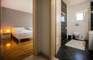 Posteľ alebo postele v izbe v ubytovaní Villa Matko - family destination