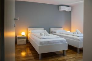 Posteľ alebo postele v izbe v ubytovaní Villa Matko - family destination