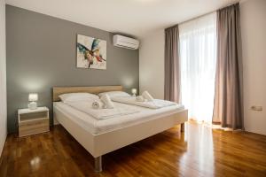 Posteľ alebo postele v izbe v ubytovaní Villa Matko - family destination + 37 fotografií
