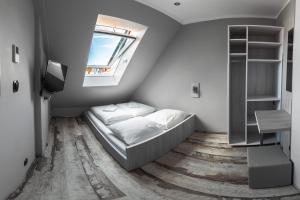 Postel nebo postele na pokoji v ubytování Do Step Inn Meidling - Self-Service-Hotel