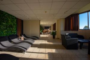 Posezení v ubytování President Hotel Montfort