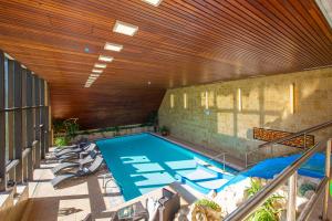 Bazén v ubytování President Hotel Montfort nebo v jeho okolí