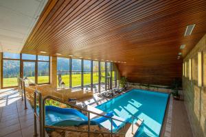 Bazén v ubytování President Hotel Montfort nebo v jeho okolí