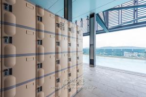 a view of a building with tall windows at Mossaz at Empire Damansara by Wodages in Kuala Selangor