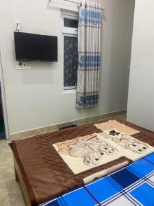 TV a/nebo společenská místnost v ubytování Khách Sạn Ngân Hà - Hotel Ngân Hà 2