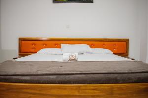 Postel nebo postele na pokoji v ubytování Hotel Cima Real