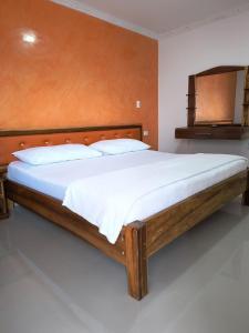 Postel nebo postele na pokoji v ubytování Hotel Cima Real