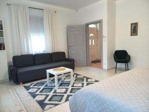 Posezení v ubytování Kertész14 Apartman