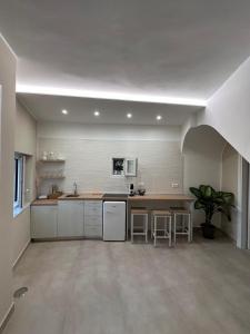 Η κουζίνα ή μικρή κουζίνα στο Ninfa Roda B&B