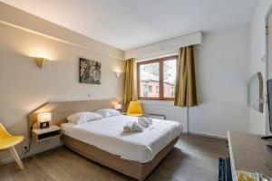 Letto o letti in una camera di Sleep & Go Brussels South