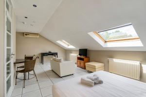 Letto o letti in una camera di Sleep & Go Brussels South