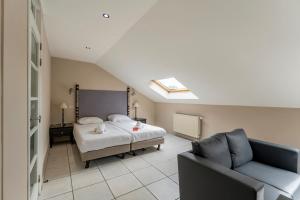 Letto o letti in una camera di Sleep & Go Brussels South