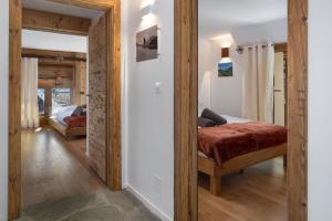 Postel nebo postele na pokoji v ubytování Pilanous House - Penthouse suite - Swiss Alps