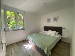 Photo de la galerie de l'établissement Ana one bedroom apartment, 1min from Old Town, Budva, à Budva
