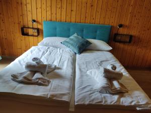 Postel nebo postele na pokoji v ubytování Silvydolomitiapartment