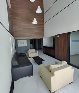 Istumisnurk majutusasutuses Apto. Beira Mar Alto Padrão - by TRH Home Stay