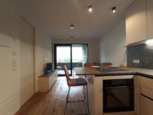 a kitchen with a sink and a counter top at Nido City Studio in Brixen