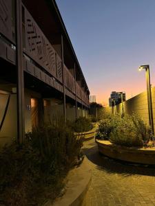 a building with some plants in front of it at Garden Block Departamentos Temporarios in San Luis +40 photos