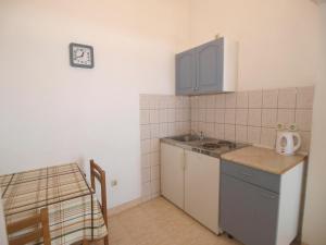 Kuchyň nebo kuchyňský kout v ubytování Apartmani Korljan