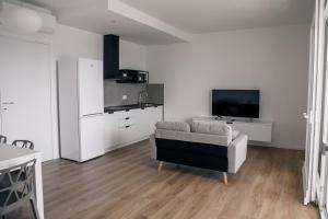 Kuchyň nebo kuchyňský kout v ubytování K Modern Apartments