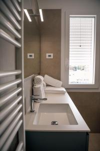 Fotografie z fotogalerie ubytování K Modern Apartments v destinaci Ronchi