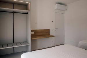 Postel nebo postele na pokoji v ubytování K Modern Apartments