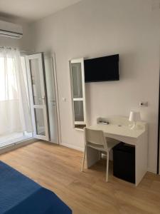 TV a/nebo společenská místnost v ubytování Mare Blu