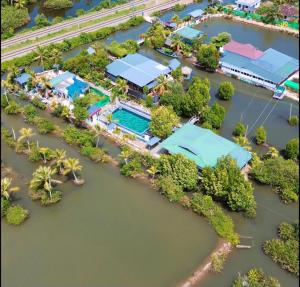 an aerial view of a resort in the water at Bell Farms and Resorts in Munroe Island