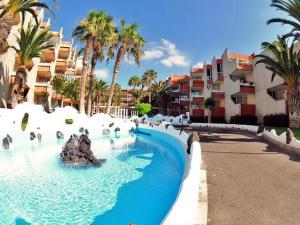 Πισίνα στο ή κοντά στο COMFORTABLE APARTMENT ON THE 1st SEA LINE IN THE SOUTH OF TENERIFE