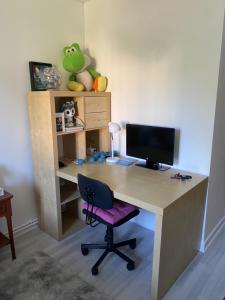 TV a/nebo společenská místnost v ubytování Appartement dans résidence calme