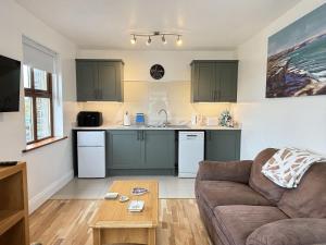 Kuchyň nebo kuchyňský kout v ubytování Apartment 471 - Clifden
