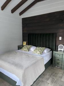 Letto o letti in una camera di Cabañas Tahamí con jacuzzi cerca al Aeropuerto
