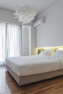 Posteľ alebo postele v izbe v ubytovaní ABA Apartment Korizi street