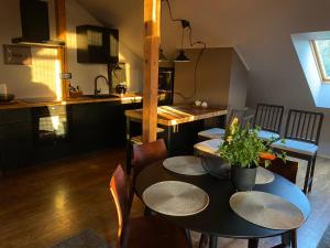 Kuchyň nebo kuchyňský kout v ubytování Konrads Apartment