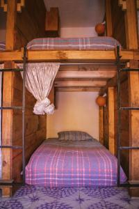 Ένα ή περισσότερα κρεβάτια σε δωμάτιο στο Casa Satoshi