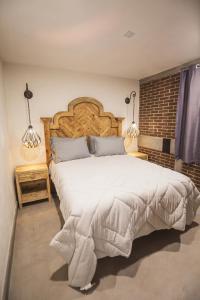 Ένα ή περισσότερα κρεβάτια σε δωμάτιο στο Elegante apartamento en San Miguel de Allende